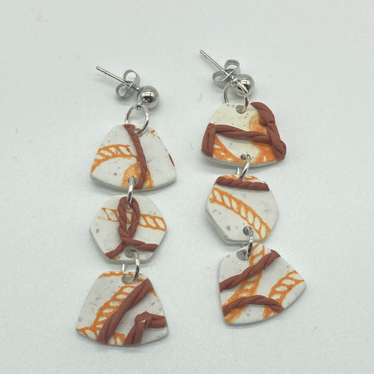 White and amber Earring