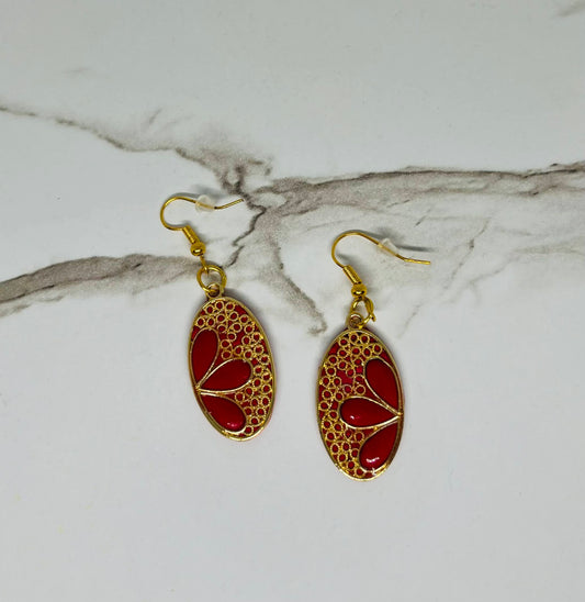 Red oval earrings with gold details