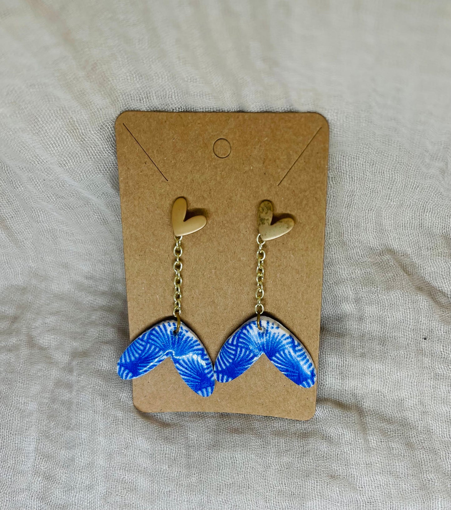 Blue and white petal earrings