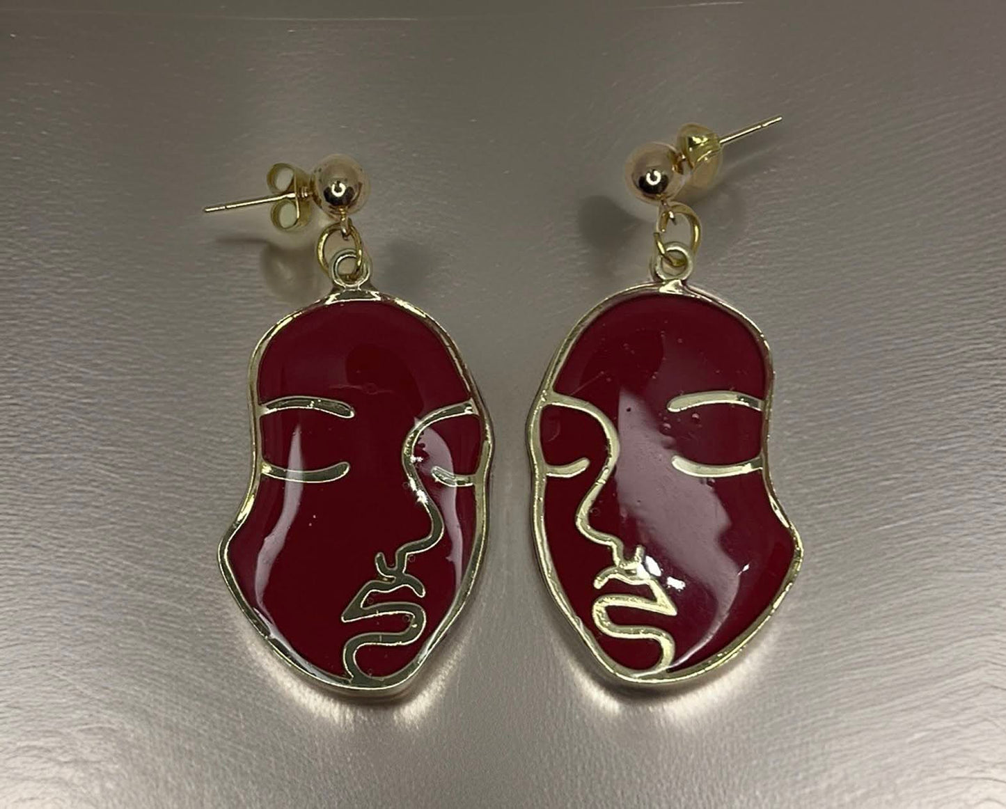 Golden Burning Face earrings