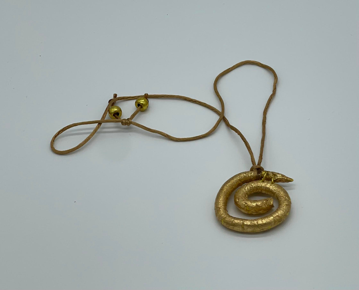 Golden Serpent Coil Necklace