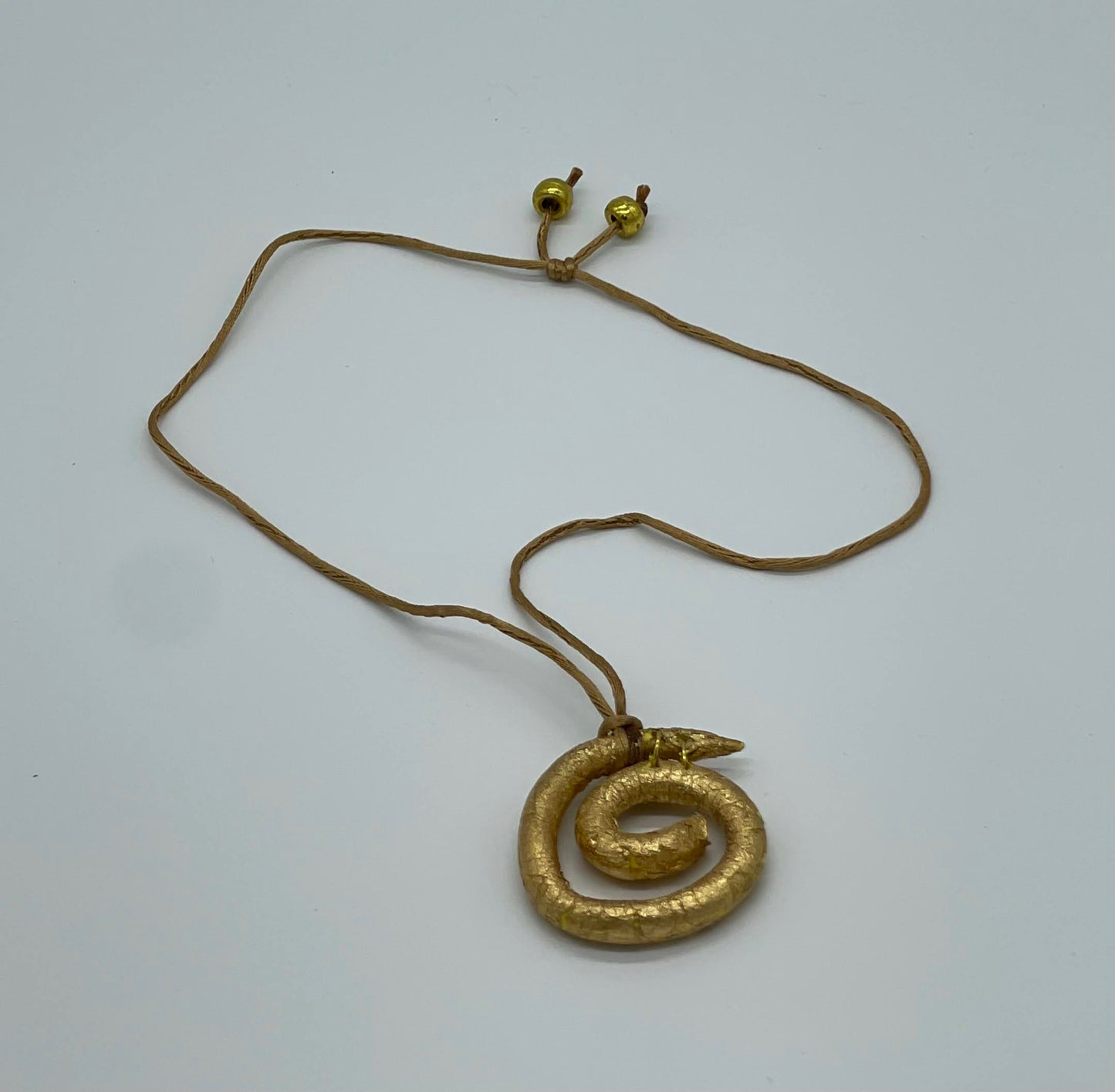 Golden Serpent Coil Necklace