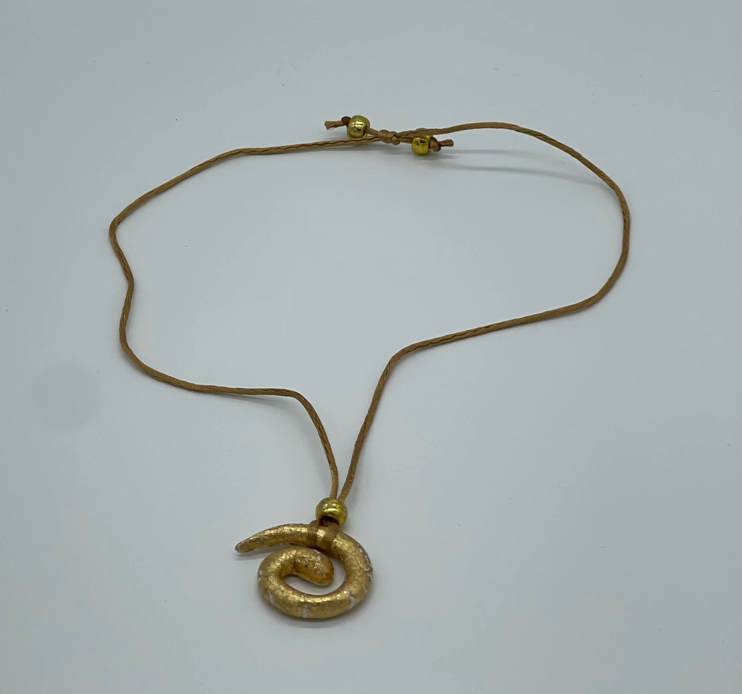 Golden Serpent Coil Necklace